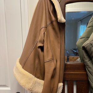 Leather Jacket. Lined. Shearling cuff, neck collar. Can wear any type of blouse